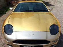 Автомобильная компания Alchemist сделала вполне золотой Aston Martin DB7 с бриллиантами